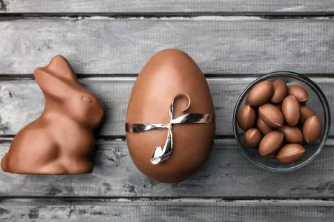 Delicious Easter chocolate bunny, eggs and sweets Stock Photos