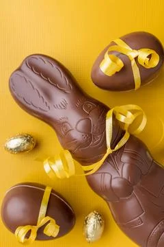 Delicious Easter chocolate bunny, eggs and sweets Stock Photos