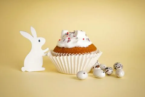 Delicious Easter cupcake on yellow background Stock Photos