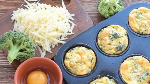 Delicious egg muffins broccoli and cheese. Stock Footage 70013104