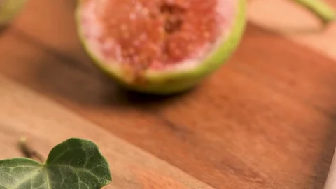 Delicious figs on kitchen coutertop Stock Footage