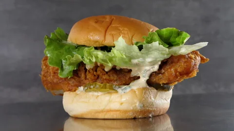 Delicious fish burger on grey background Stock Footage 196277759