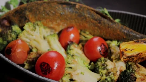 A delicious fish dish with vegetables Video stock 328424582