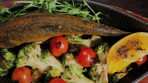 A delicious fish dish with vegetables Stock Footage 328424623