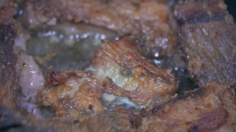 Delicious fish is fried in a pan macro Stock Footage 102439725