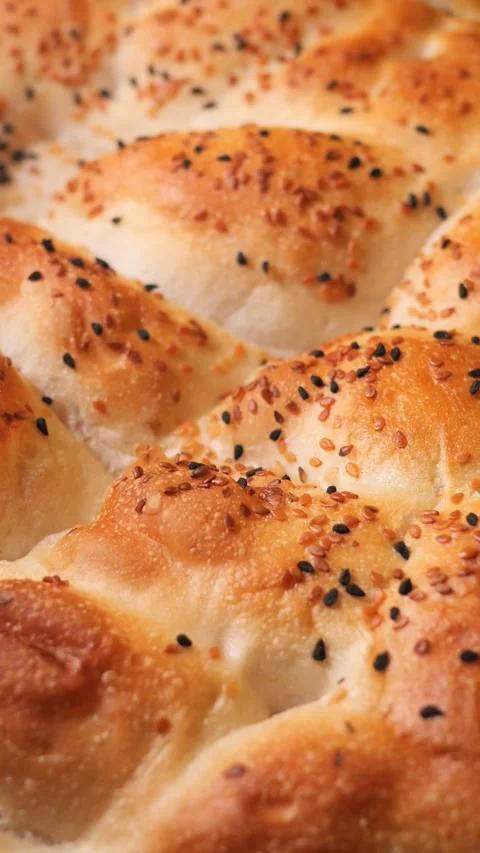Delicious fresh bread comes to life in the kitchen Stock Footage 338375872