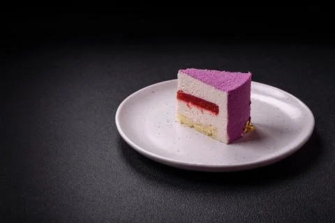 Delicious fresh sweet mousse cake with berry filling Stock Photos