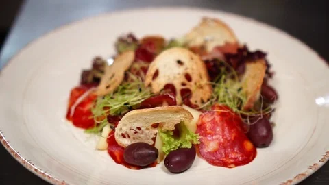 Delicious fresh vegetable Caesar salad in detailed close up healthy food Stock Footage 106812684