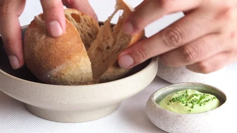Delicious, Freshly Baked Bread Served With Butter and Chive Cream Spread, UK Stock Footage 274440850