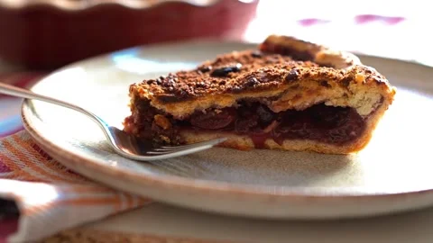 Delicious Freshly Baked Cherry Pie with Golden Crust Stock Footage 329442536