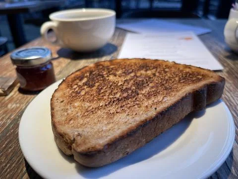 Delicious freshly toasted slice of bread on the plate Stock Photos