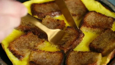 Delicious fried bread and egg breakfast being eaten Stock Footage 337830828
