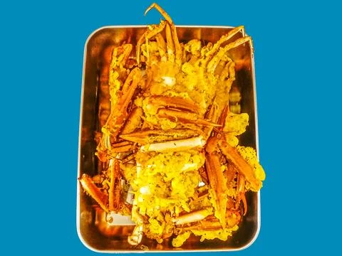 Delicious fried crab dish in a container Stock Photos