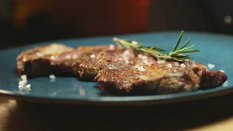 Delicious fried meat at the restaurant Stock Footage 153156108