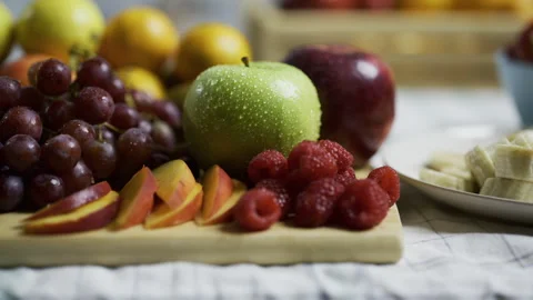 Delicious fruit assembled on kitchen counter - close up tracking shot Stock Footage 341208002