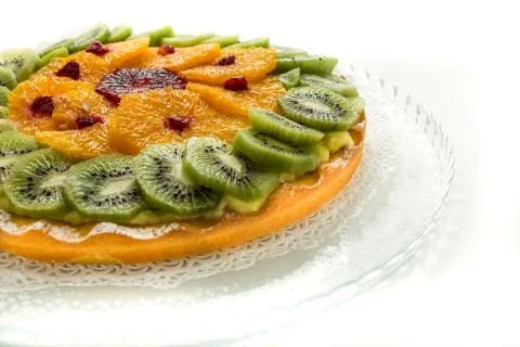 Delicious fruit cake in a white backdrop Stock Photos