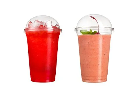 Delicious fruit smoothies in plastic cups, on a white background. Two cocktai Stock Photos