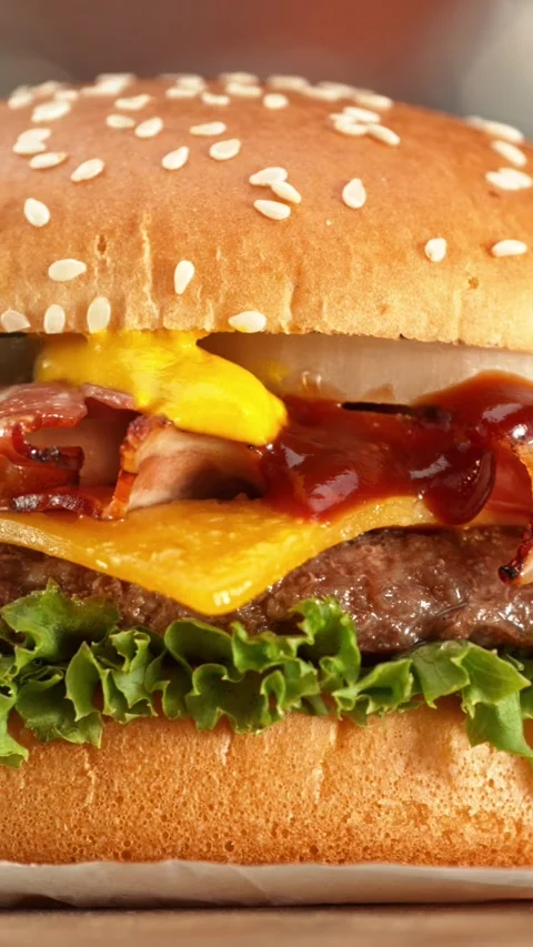 Delicious Hamburger with Cheese, Camera Moving Around. Stock Footage 296741460