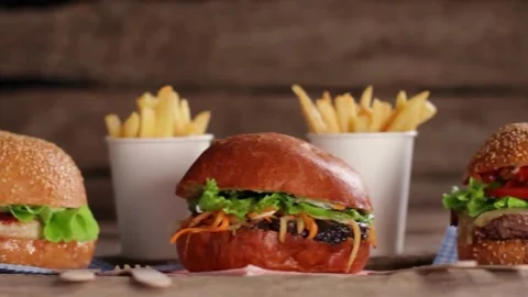 Delicious hamburger with grilled beef steak served on chef's table 4k footage Stock-Footage 336579588