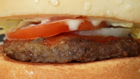 Delicious hamburger in the video. 4K. Stock Footage 267633803