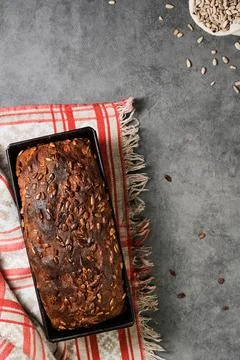 Delicious homemade rectangular wheat and rye bread with seeds, top view. 스톡 사진