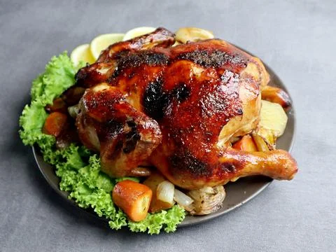 Delicious Honey Roasted Chicken With Vegetable Garnish Stock Photos