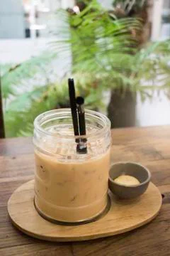 Delicious iced coffee with cookie Stock-Fotos