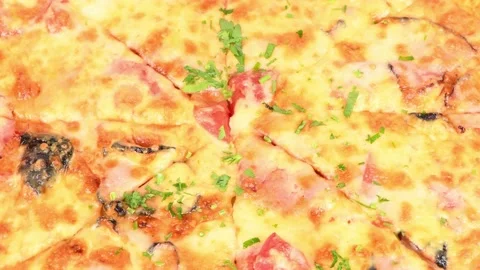 Delicious italian pizza close up. Loop motion. Side view. Stock Footage 161082154