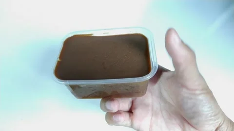 Delicious jelly pudding in a transparent container Stock Footage 272837384