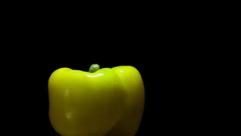 Delicious juicy pepper on black background  Stock Footage 70928362