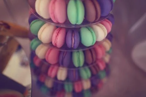 Delicious macaroons on a rounded plate 스톡 사진