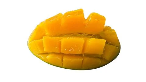Delicious mango half expertly diced into perfect cubes on white background Stock Photos