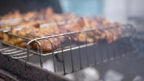 Delicious Marinated Meat Grilling Over Hot Charcoal on Outdoor Barbecue Grill Video stock 339067556