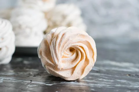Delicious marshmallow close up on gray background with copy space Stock Photos