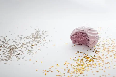 Delicious marshmallows on a white background with a bright decor Stock Photos