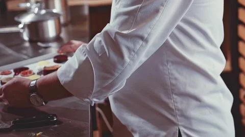 A delicious meal is presented by the chef in a kitchen. Slow Motion. 스톡 동영상 53897102
