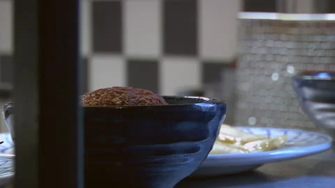 Delicious Meatballs Cusine With A Side Of Stuffed Tomatoe Stock Footage 136693532