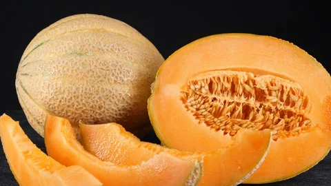 Delicious melon isolated on the black background Stock Footage 113680864