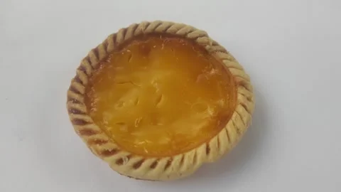A Delicious Milk Pie with A White Background Stock Footage 312299346