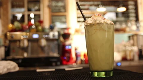 Delicious milkshake on bar counter Stock Footage 85502853