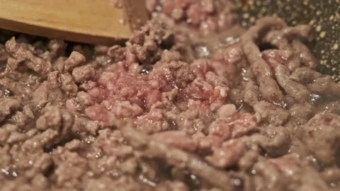 Delicious Minced Beef Meat Macro View in a Pan Stock Footage 145723396