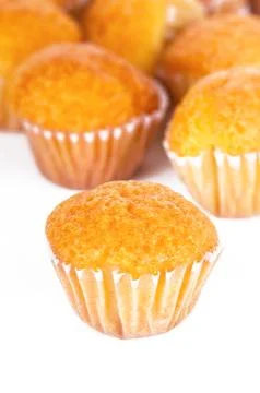 Delicious mini muffins on a white background Stock Photos