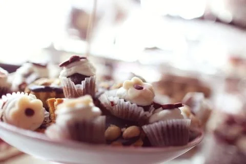 Delicious mix of sweets on table Stock Photos