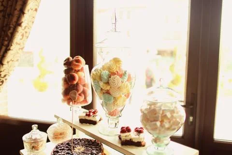 Delicious mix of sweets on table Stock Photos