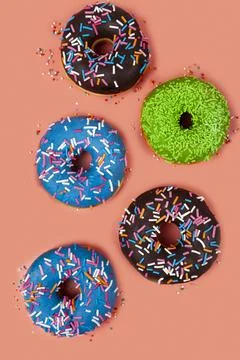 Delicious multicolored donuts Stock Photos