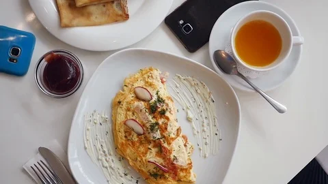 Delicious nutritious breakfast on the table, top view. slow motion, 1920x1080 Stock Footage 97926762