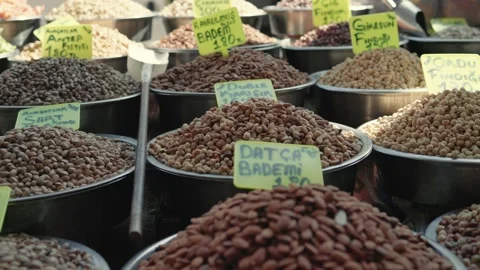 Delicious nuts on the shelves of the oriental bazaar. Slow motion Stock Footage 189356719