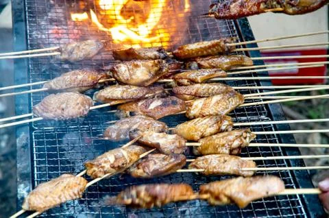 Delicious outdoor grilled chicken wings Stock Photos