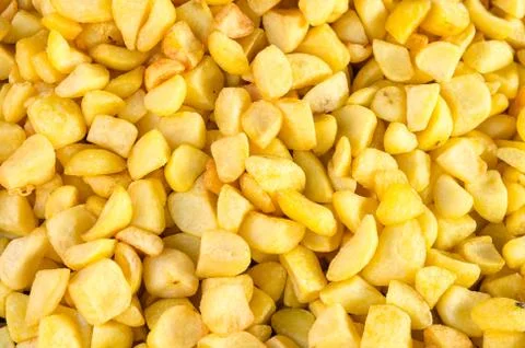 Delicious pan fried potatoes texture or background Foto stock