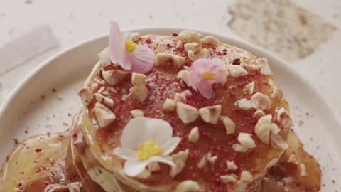 Delicious pancake slide dessert with raspberry chocolate and hazelnuts 스톡 동영상 151362125